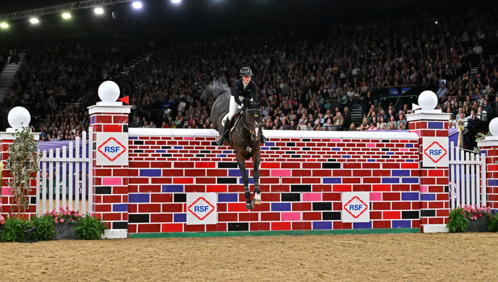 Rachel Proudley clears the HOYS puissance wall