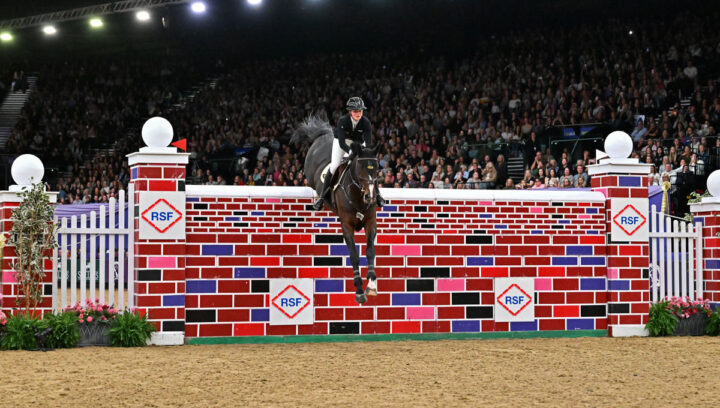 Rachel Proudley clears the HOYS puissance wall